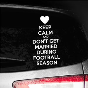 Car decal with heart and white text: Keep Calm and Don’t Get Married During Football Season