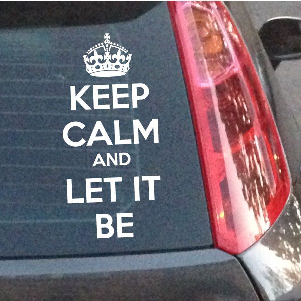 Keep Calm and Let It Be decal with crown and large white lettering on dark surface