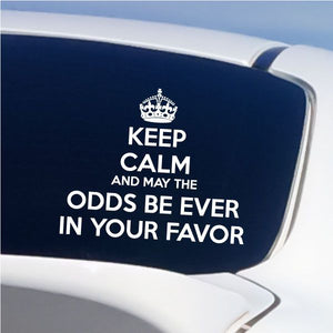 Navy decal with white crown and slogan text on a curved surface