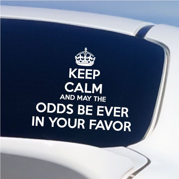 Navy decal with white crown and slogan text on a curved surface