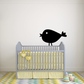 Black chick wall decal perched on crib rail bars