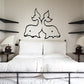 Kids dolphin wall decal with black outline of two dolphins with a heart shape