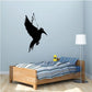Flying bird wall decal, black silhouette with wings spread and beak pointed