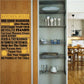 Kitchen rules word collage decal with multicolored block text on tan background