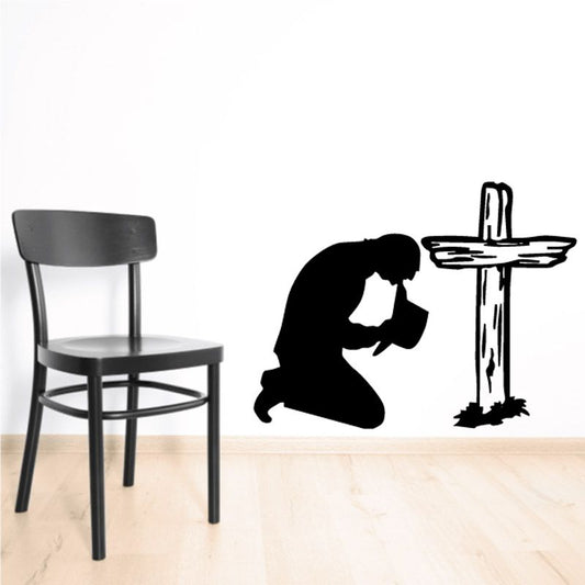 Image of Kneeling Before a wooden Cross Decal