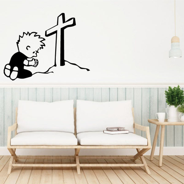 Kneeling praying decal with child kneeling beside a cross, black and white