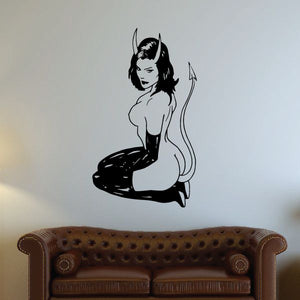 Kneeling devil girl decal with black horns, seated pose and long boots