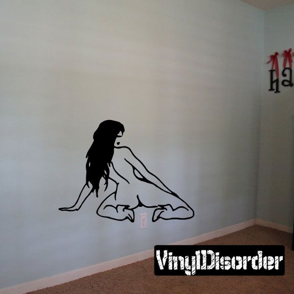 Kneeling woman silhouette wall decal, black outline with light accents