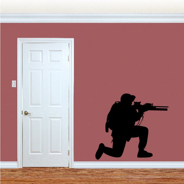 Black kneeling soldier aiming rifle wall decal silhouette