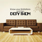 Inspirational wall decal reading "Know your limitations and then DEFY THEM"