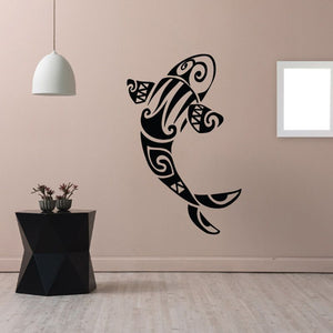 Koi fish tribal wall decal in black, swirling line art with fins and tail
