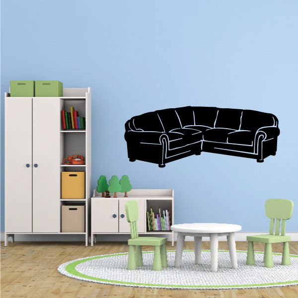 Black L-shaped couch wall decal with white line accents