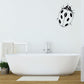 Ladybug wall decal with black spots and antenna, simple line illustration