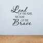 Inspirational wall decal with script text: “Land of the Free, Because of the Brave”