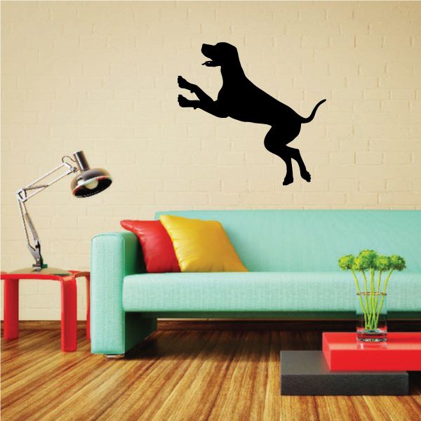 Landing coonhound decal, black dog silhouette mid-leap with paws forward.