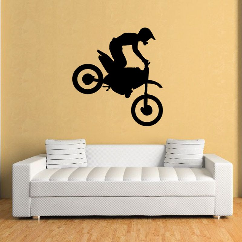 Black dirt bike rider decal silhouette with front and rear wheels on wall