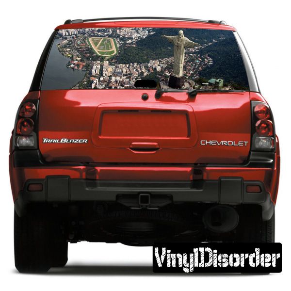 Red SUV rear window graphic decal with city view through back glass