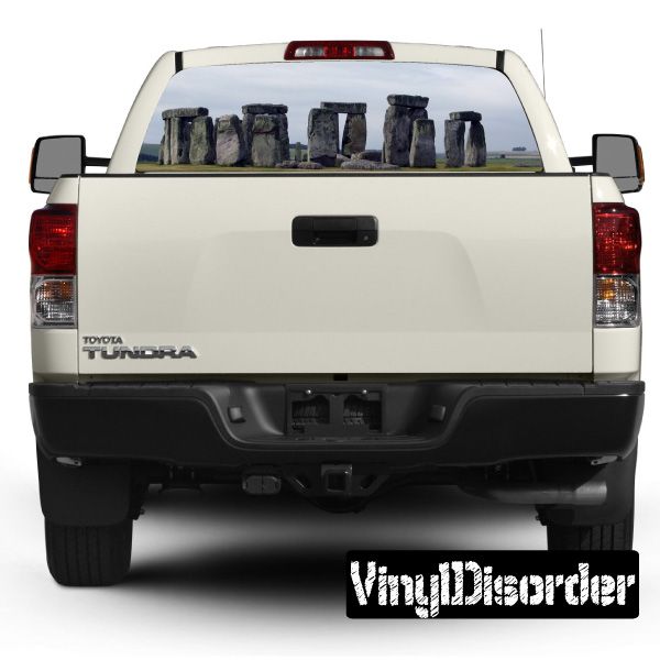 Vehicle rear window graphic showing stone pillar landmarks