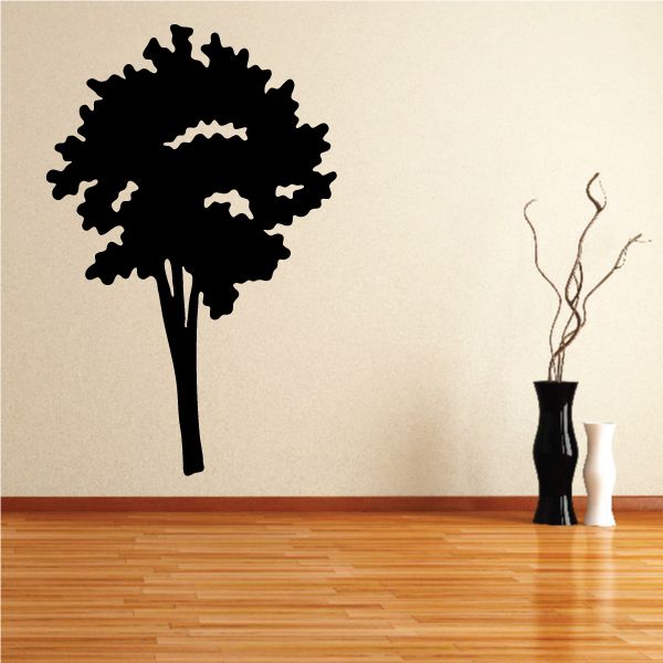 Vinyl wall decal featuring a black tree silhouette