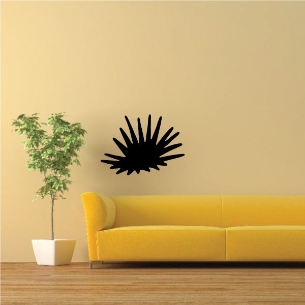 Landscape wall decal with black sunburst and small green tree