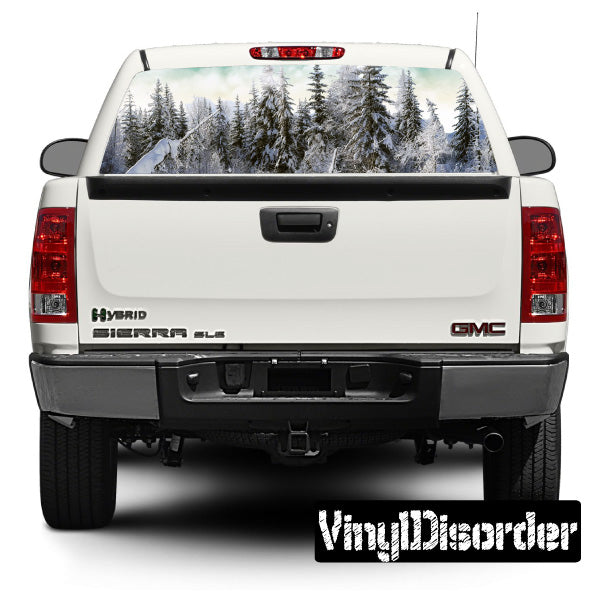 Snowy landscape rear window graphic decal on a car