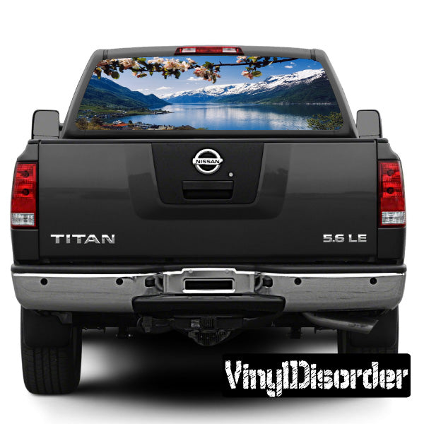 Rear window landscape graphic with mountains, lake scene, and clear view through