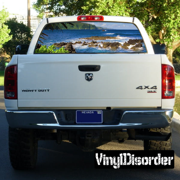 Truck rear window landscape graphic with ocean waves on white pickup back window