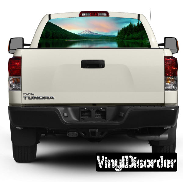 Car rear window graphic landscape print on pickup truck, rear view