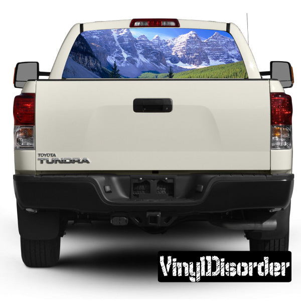 Pickup truck rear window graphic with mountain landscape view