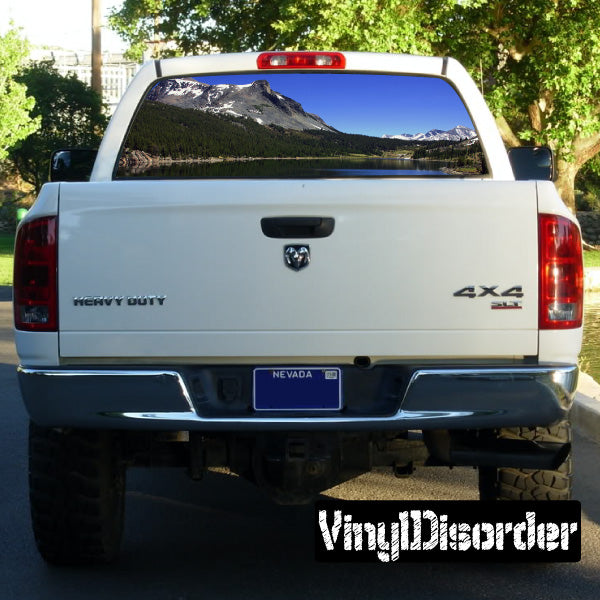 Truck rear window graphic with mountain and lake landscape scene