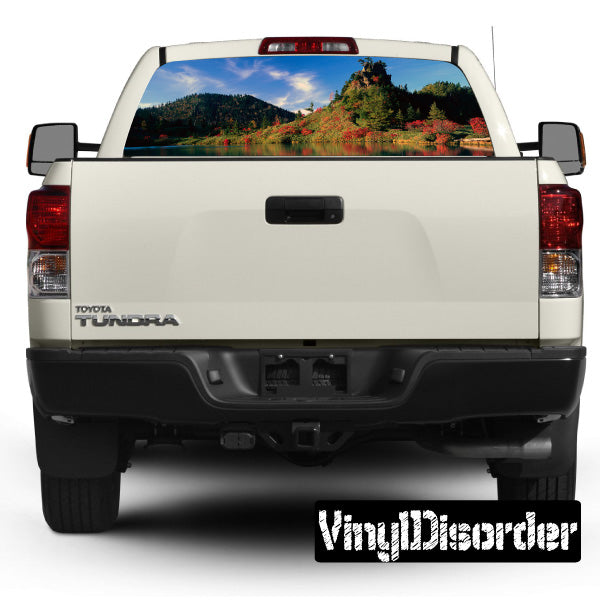 Vehicle rear window graphic with landscape scene view