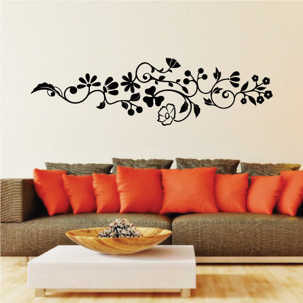Large vinyl wall decal with black floral scroll design