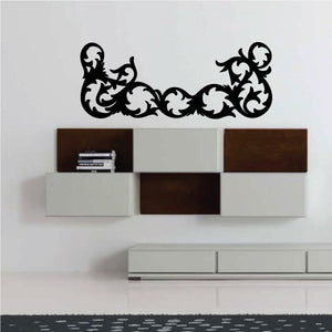 Ornate black vinyl wall decal with decorative scroll swirls