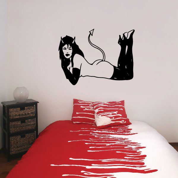 Black devil girl wall decal with raised legs, curled tail and horned head