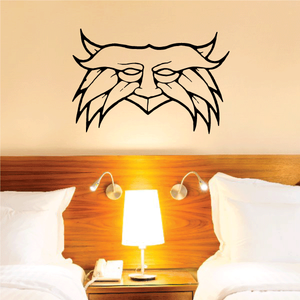Leafy mask wall decal, black outline face with leafy hair and horns
