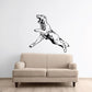 Leaping coyote decal with black line-art figure on a light surface
