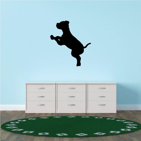 Leaping puppy decal: black jumping dog silhouette