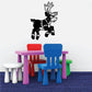 Leaping reindeer decal with black and white outline, antlers and hooves