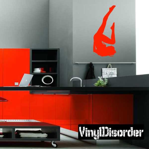 Red pinup silhouette decal of a kneeling woman with one leg raised