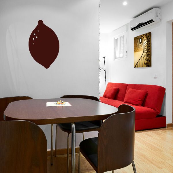 Lemon fruit decal, dark red-brown fruit shape with small dots