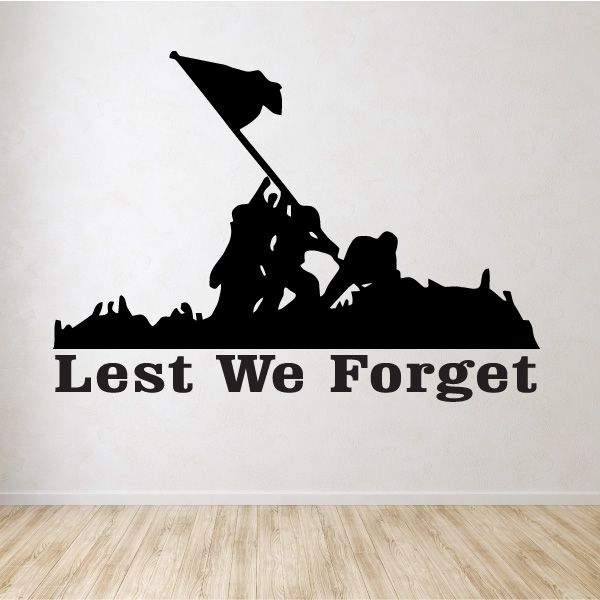 Wall decal featuring black soldier silhouette with flag and text Lest We Forget