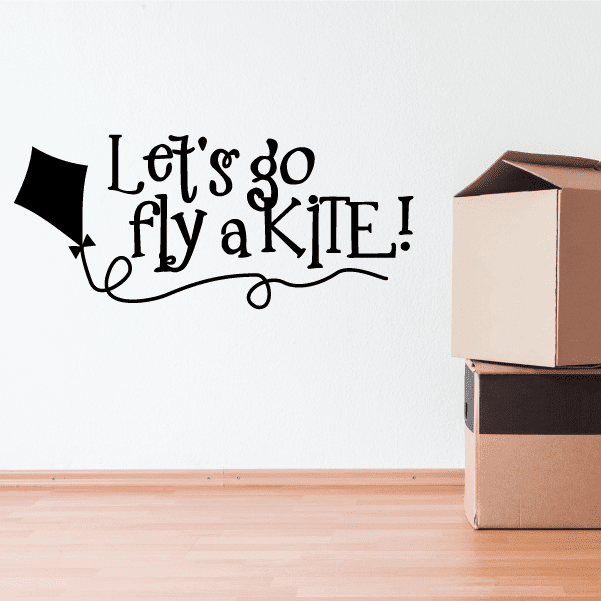 Kite wall decal with text “Let’s go fly a KITE!” and decorative arrow.