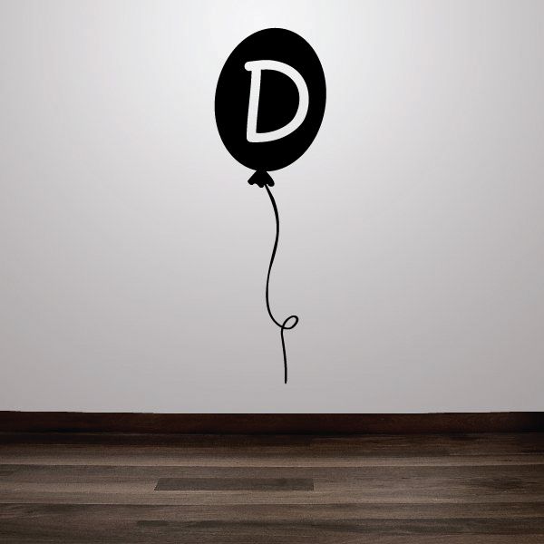 Black balloon decal shaped with white letter D and attached string
