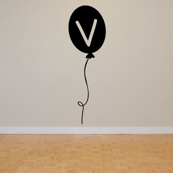 Black letter V balloon decal with attached balloon string and curly tail
