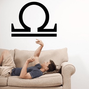 Libra symbol wall decal, black circular scales icon
