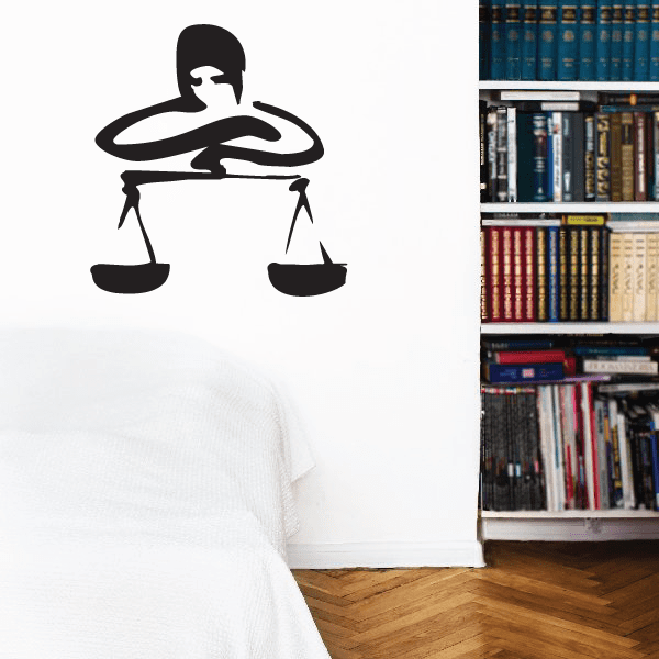 Libra artistic scales decal, black balance scale and figure silhouette on wall