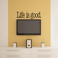 Wall decal with “Life is good” quote in large stylized serif lettering