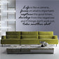 Wall decal with cursive quote text, 'Life is like a camera... take another shot'
