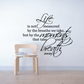 Wall decal with black cursive quote: "Life… breath away" and decorative script accents
