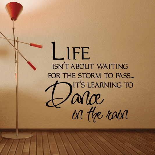 Image of Life isn't about waiting for the storm to pass its learning to dance in the rain Wall Decal